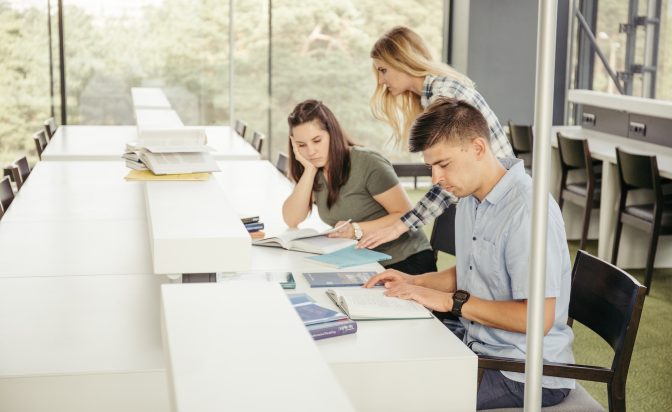 classmates-reading-table-library